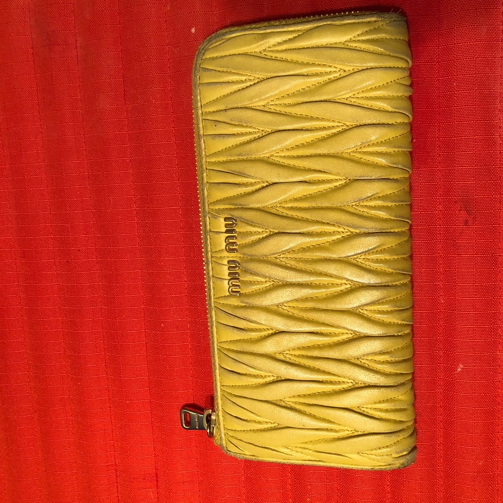 TODAY ONLY: AUTHENTIC MIUMIU YELLOW WALLET Lots of dirt &scruffs on sides AS IS